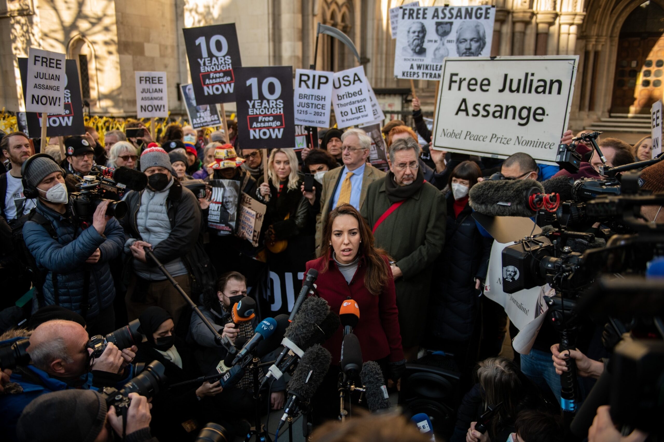 PHOTO: Stella Morris, partner of Julian Assange, speaks to the press outside the Royal Courts of Justice following an extradition hearing on December 10, 2021 in London, England.