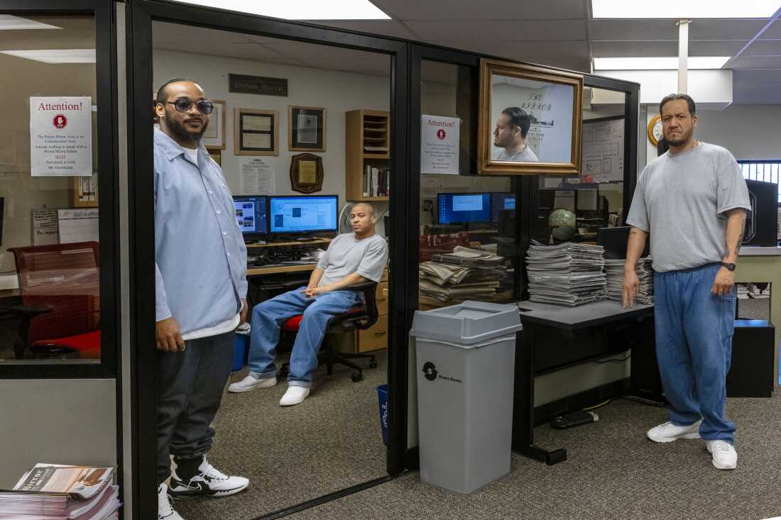 Richard Adams, left, Paul Gordon, center; and Patrick Bonga make up the staff of the Prison Mirror at the Minnesota Correctional Facility - Stillwater. The men say they're limited in what they can write about, but they still find meaning in the work.