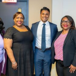 Ryan Budhu poses with former NYC Corporation Counsel Hon. Sylvia Hinds-Radix (left) and her staff during the NYC Law Department’s AANHPI Heritage Month event. Photo courtesy of the NYC Law Department