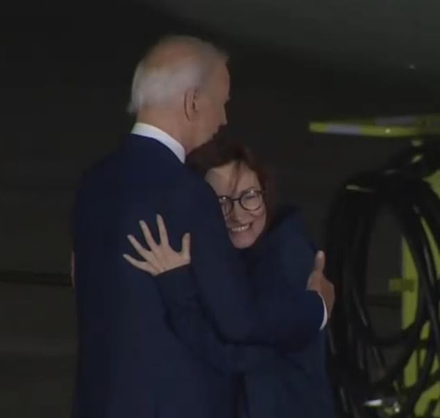 She was seen embracing the president as well, after speaking briefly with both him and Harris. She had been detained for more than six years