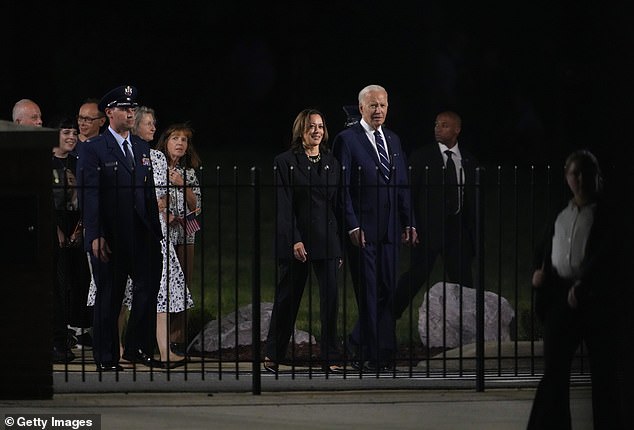 Harris and Biden - credited with negotiating the deal - arrived separately in their own motorcades moments before, and happily welcomed the now-freed hostages