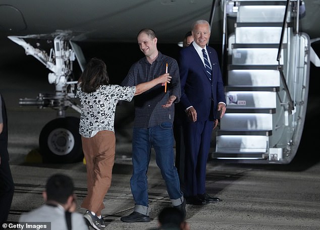 The plane landed at Joint Base Andrews in Maryland just before midnight, with Gershkovich, a 32-year-old reporter imprisoned last year under suspicion of espionage, seen disembarking here. His mother Ella Milman was seen giving him a warm hug as President Joe Biden looked on