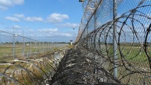 prison-fence-218459_1920.jpg