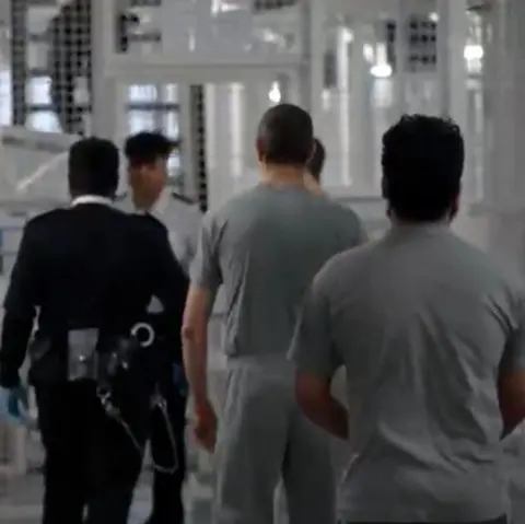 BBC Prisoners and guards inside a wing of HMP Pentonville.