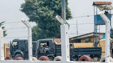 EPA Security vehicles and a security tower at Makala Prison in Kinshasa, DR Congo - September 2024