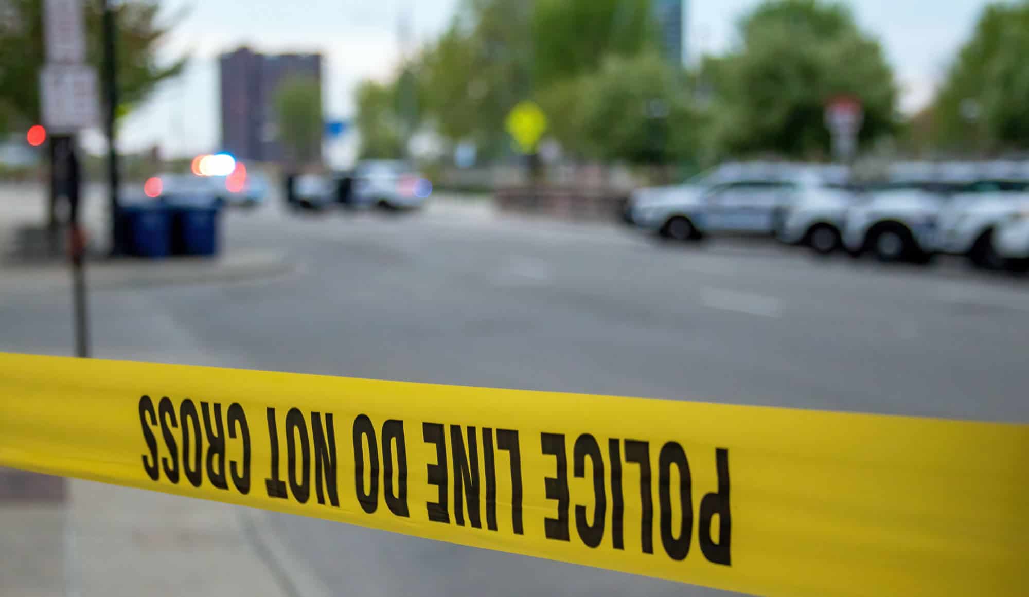 Police tape is used to cordon off crime scenes. (Image depicts the aftermath of Ma'Khia Bryant demonstrations in April 2017 in Columbus, Ohio.)