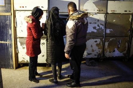 People search for missing relatives at the morgue of Mujtahid hospital in Damascus.