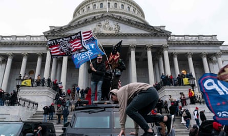 Supporters of Donald Trump riot outside the US Capitol in January 2021.