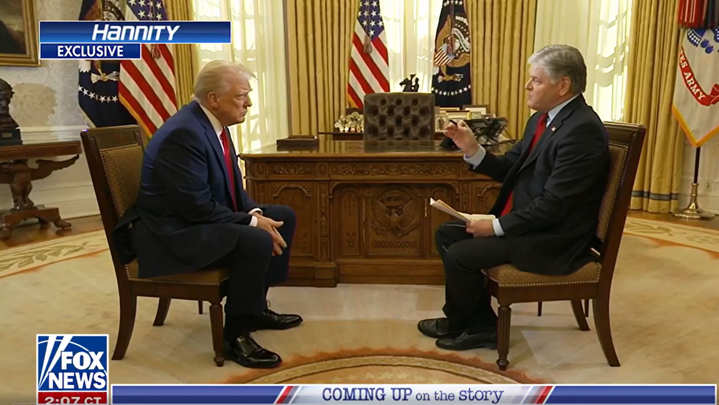 Sean Hannity interviewing Donald Trump in the Oval Office.