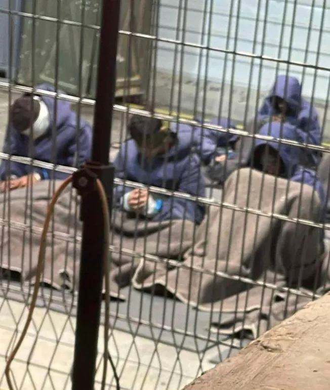 Palestinian prisoners captured in the Gaza Strip by Israeli forces are seen at a detention facility in late 2023 on a military base in southern Israel. (Photo: Breaking The Silence via AP)