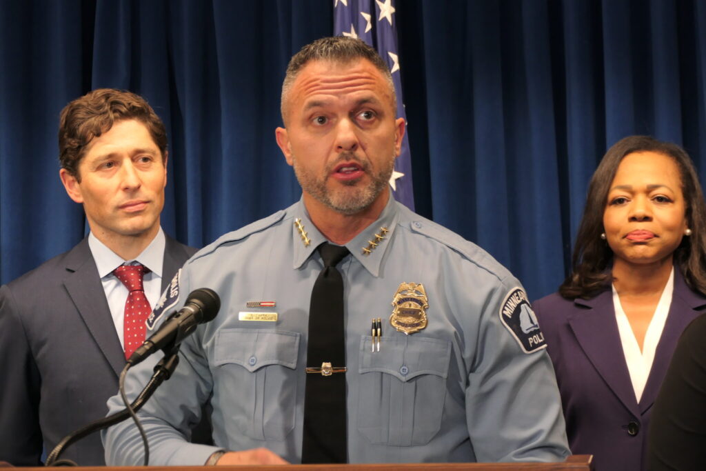 Minneapolis Mayor Jacob Frey and Kristen Clarke, the U.S. assistant attorney general for civil rights, watch at Minneapolis Police Chief Brian O’Hara delivers remarks at a press conference announcing the filing of a consent decree mandating police reforms on Jan. 6, 2025. 